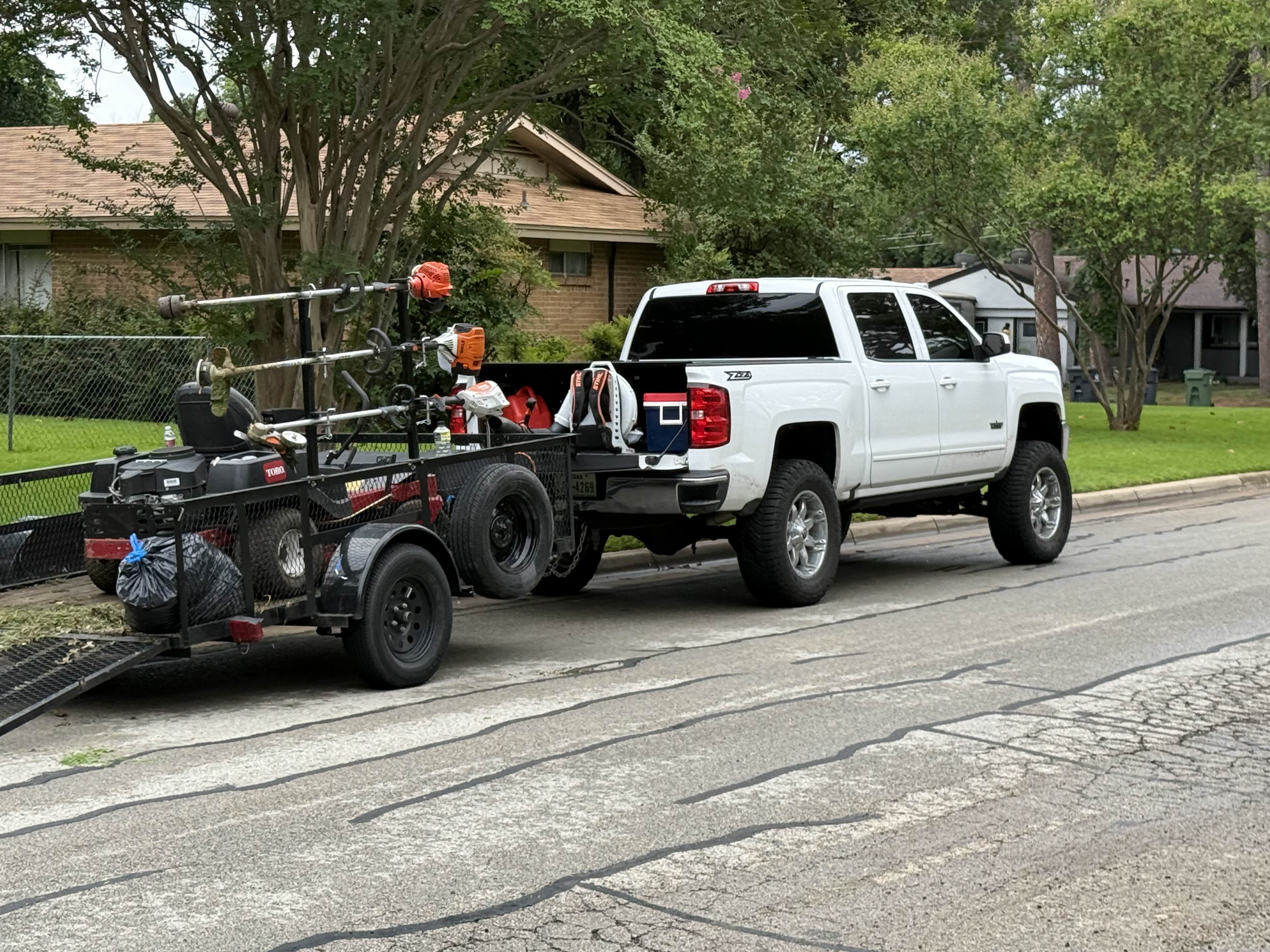 Jason's Lawn Care truck and trailer